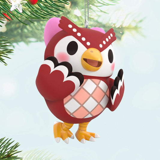 Nintendo Animal Crossing™ Celeste — Hallmark Keepsake Christmas Ornament, plastic owl design with a pink hat, hanging on a tree.
