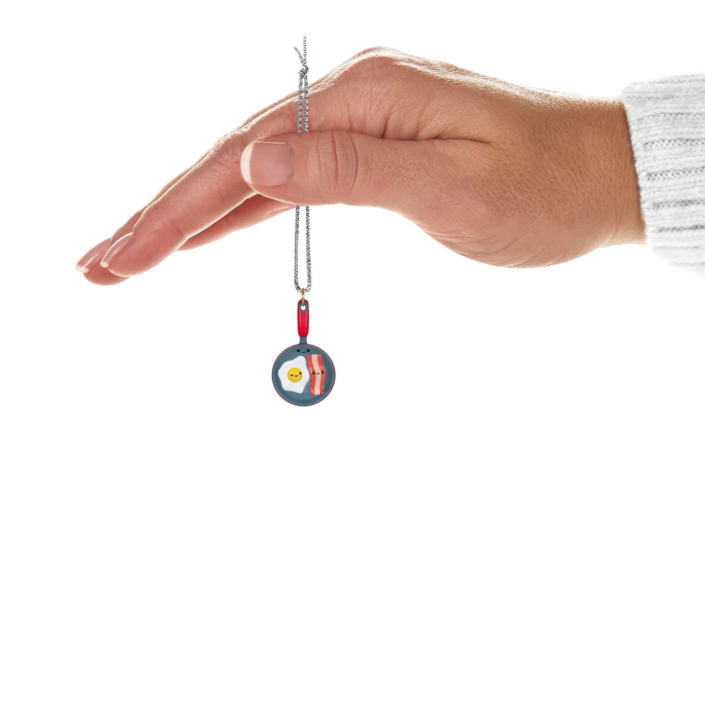 Bacon and Eggs, Better Together (Miniature) — Hallmark Keepsake Ornament held in hand, featuring a detailed frying pan design.