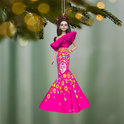 Barbie™ Día De Muertos — 2026 Hallmark Keepsake Christmas Ornament, pink gown with sugar skulls, hanging ornament on a Christmas tree.