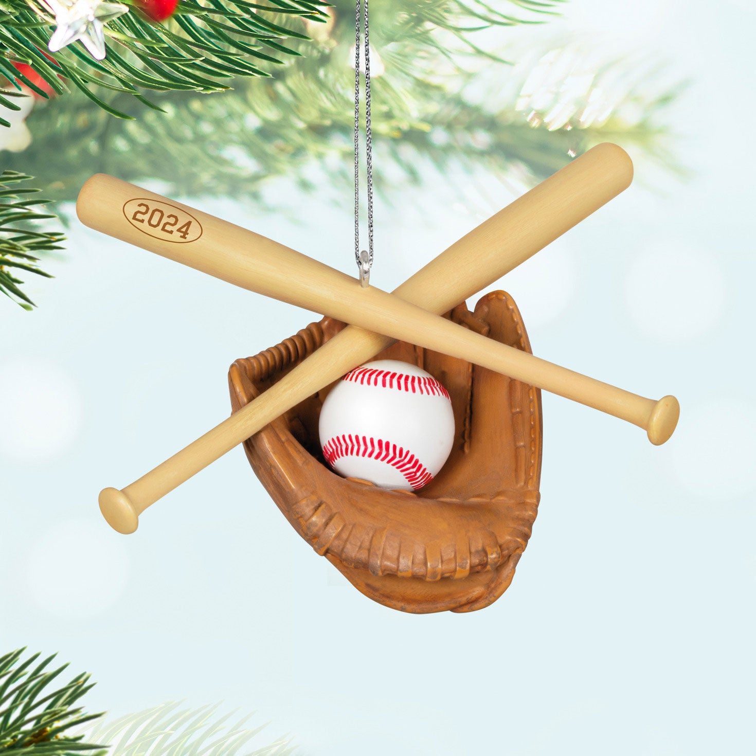 Baseball Star — Hallmark Keepsake Christmas Ornament, plastic design featuring a baseball in a mitt and crossed bats, 2024 detail.