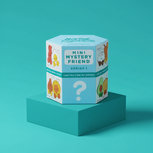Box of Mini Mystery Friend series 1 on a teal platform with a teal background