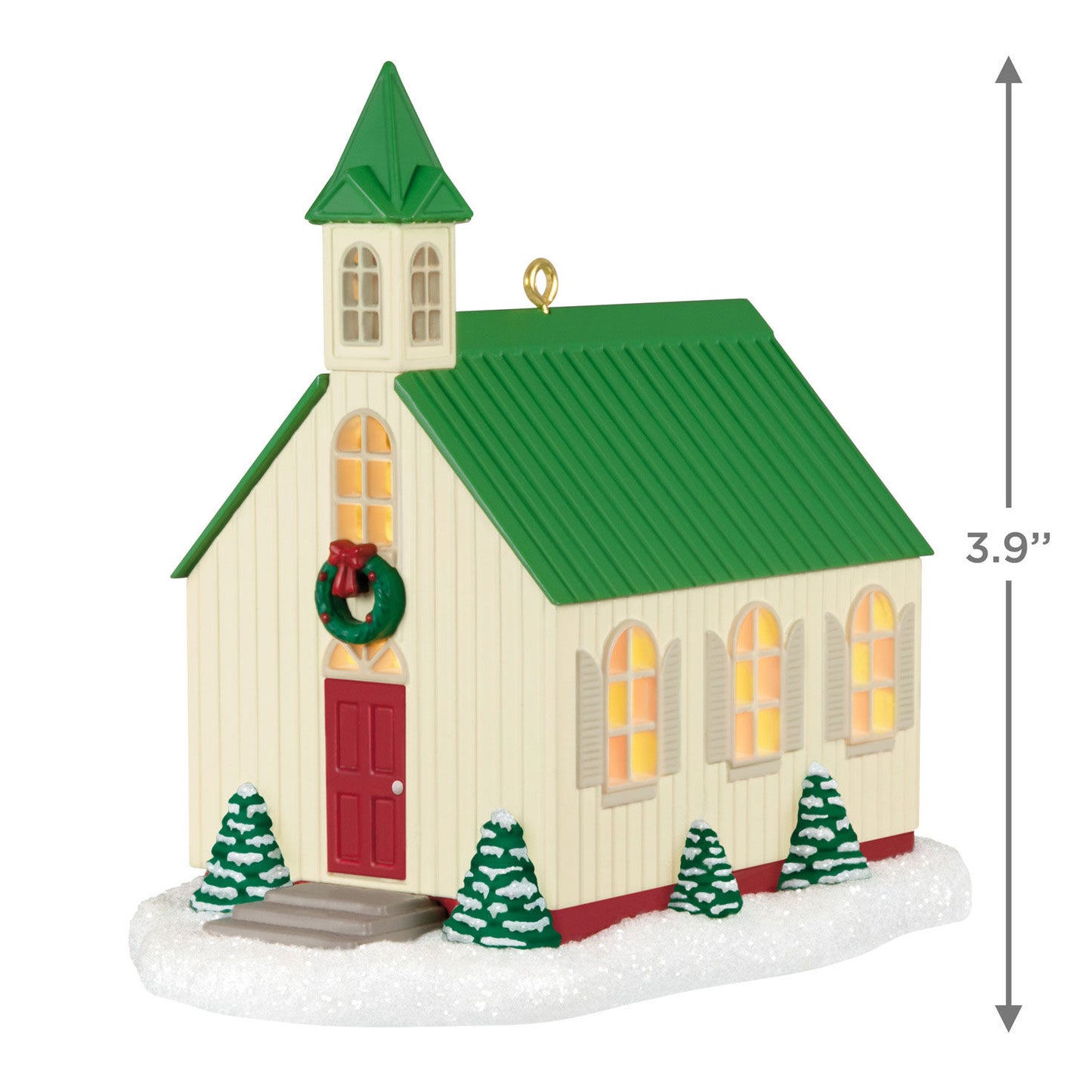 The Light of Hope — Hallmark Keepsake Christmas Ornament featuring a church with a green roof, red door, and snowy base in a flat lay view.