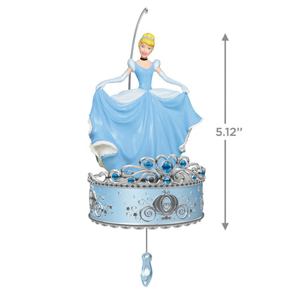 Disney Cinderella, Twirling at the Ball — Hallmark Keepsake Christmas Ornament shows Cinderella in a blue gown on a decorative base.