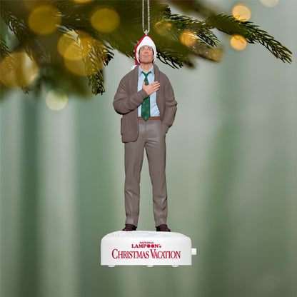 National Lampoon's Christmas Vacation™ Clark Griswold With Sound — 2026 Hallmark Keepsake Christmas Ornament, festive details of Clark in a Santa hat over a heartwarming Christmas background.