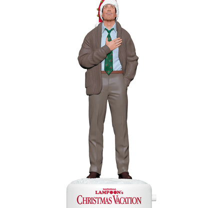 National Lampoon's Christmas Vacation™ Clark Griswold With Sound — 2026 Hallmark Keepsake Christmas Ornament, figurine in Santa hat and tie, detailed view.