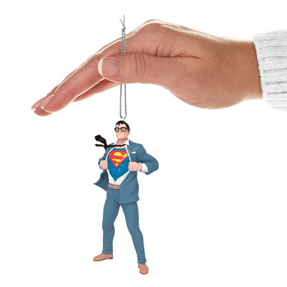 DC™ Superman™ Clark Kent™ — Hallmark Keepsake Christmas Ornament held by a hand, featuring Clark revealing his S-Shield suit.