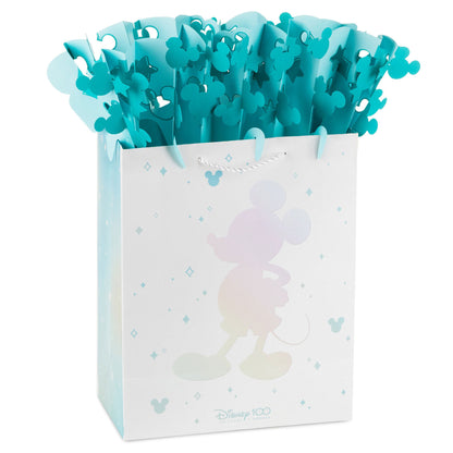 Disney 100 Years of Wonder large gift bag with WonderFill topper in blue featuring Mickey Mouse silhouette and confetti details.