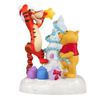 Disney Winnie the Pooh A Tigger-ific Tree Musical With Light — 2026 Hallmark Keepsake Christmas Ornament featuring Tigger and Pooh decorating a tree with lights.