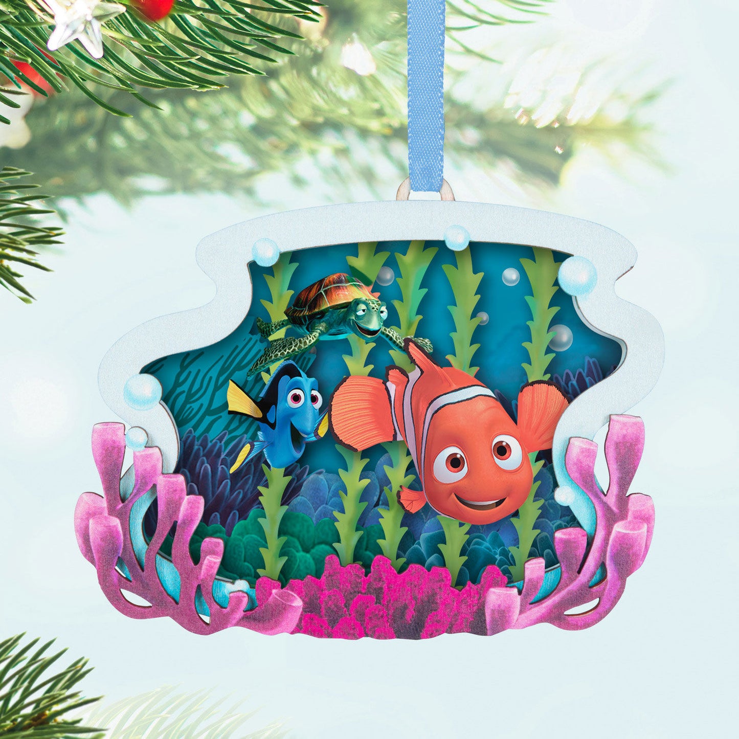 Disney and Pixar Finding Nemo, Totally Unforgettable Friends Papercraft Christmas ornament featuring colourful papercraft scene with Nemo, Dory and Crush.