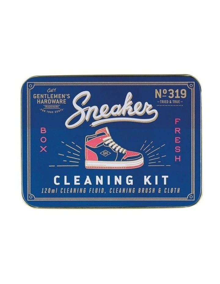 Sneaker cleaning kit in a decorative blue tin featuring cleaning fluid, brush and cloth for easy sneaker restoration.