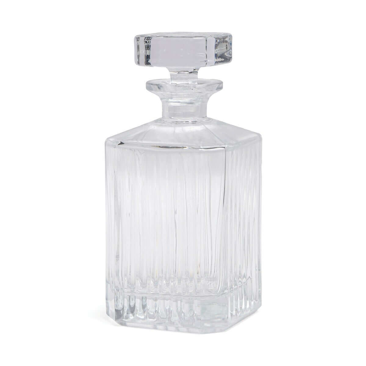 Whisky decanter made from clear glass with vertical ribbing design and a simple square stopper, side view.