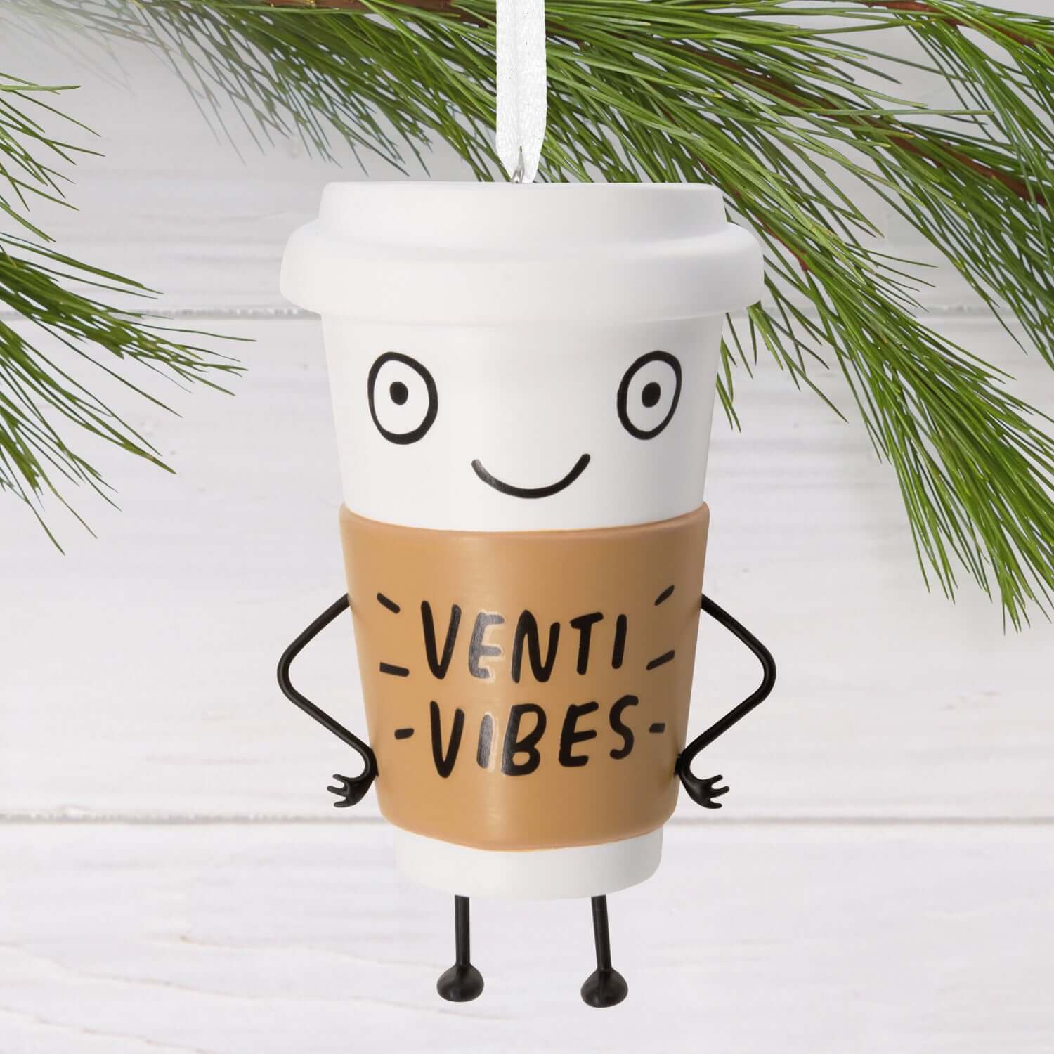 Venti Vibes Coffee Cup - Hallmark Christmas Ornament with playful character design and arms, hanging on a Christmas tree branch.