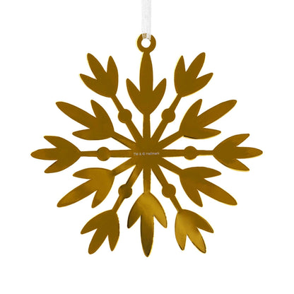 Signature Gold Snowflake, Metal - Hallmark Christmas Ornament in shiny gold finish with intricate cut-out design, close-up view.