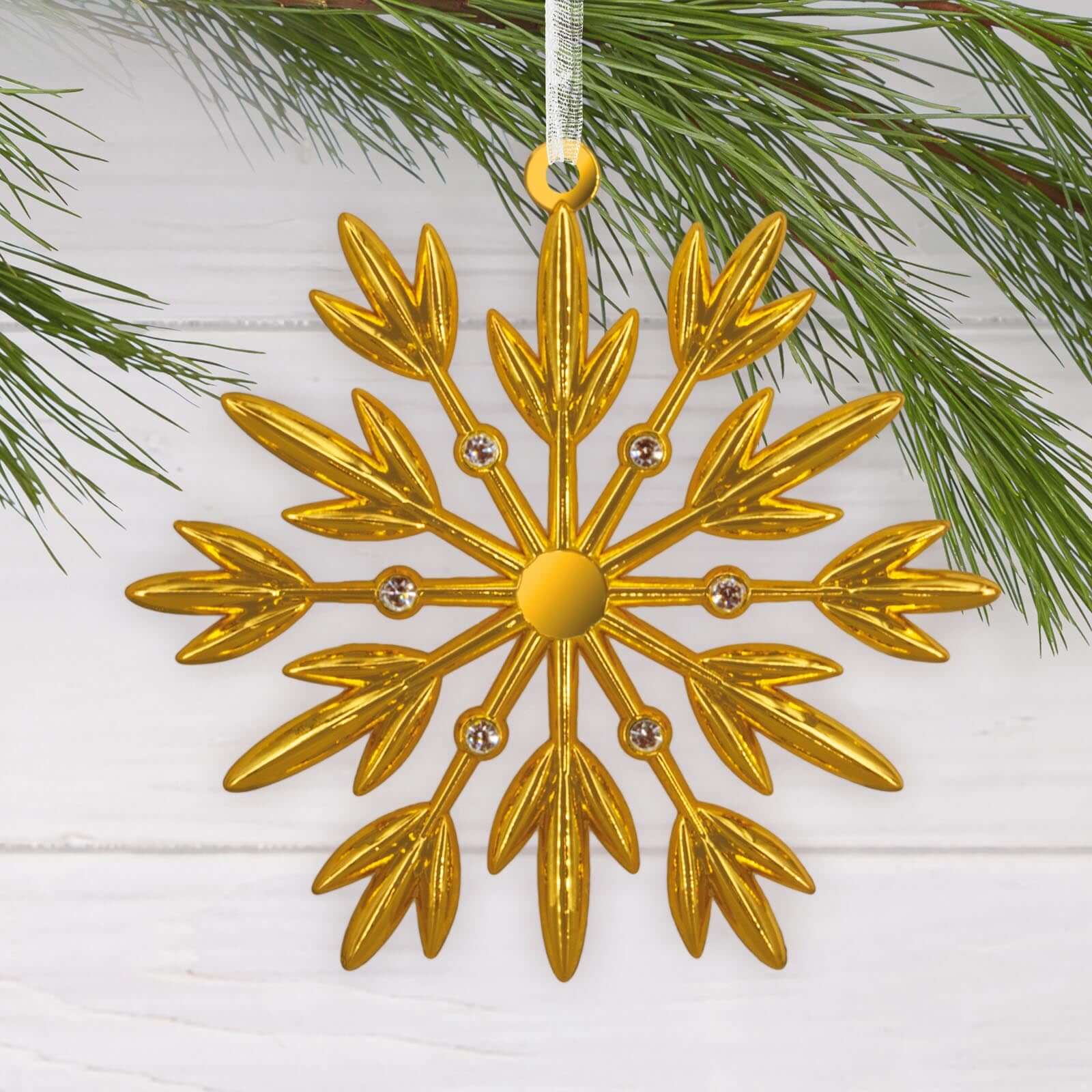 Signature Gold Snowflake, Metal - Hallmark Christmas Ornament featuring shiny gold finish and sparkling gemstone accents, close up view.