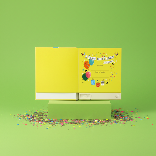 Yellow children's book with 'Happy Birthday' on a green background