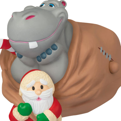 I Want a Hippopotamus for Christmas Musical — 2026 Hallmark Keepsake Christmas Ornament featuring Santa and a hippo in a sack, close up detail.