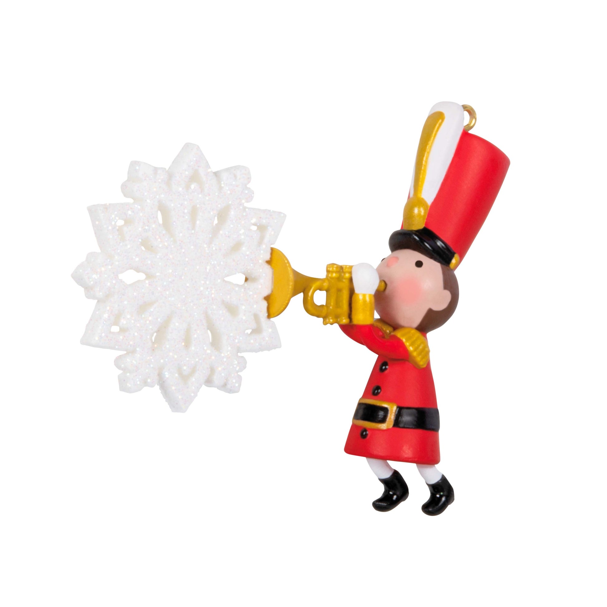 Terrific Trumpet — Hallmark Keepsake Christmas Ornament, marching toy soldier in red uniform, glittery snowflake detail, side view.