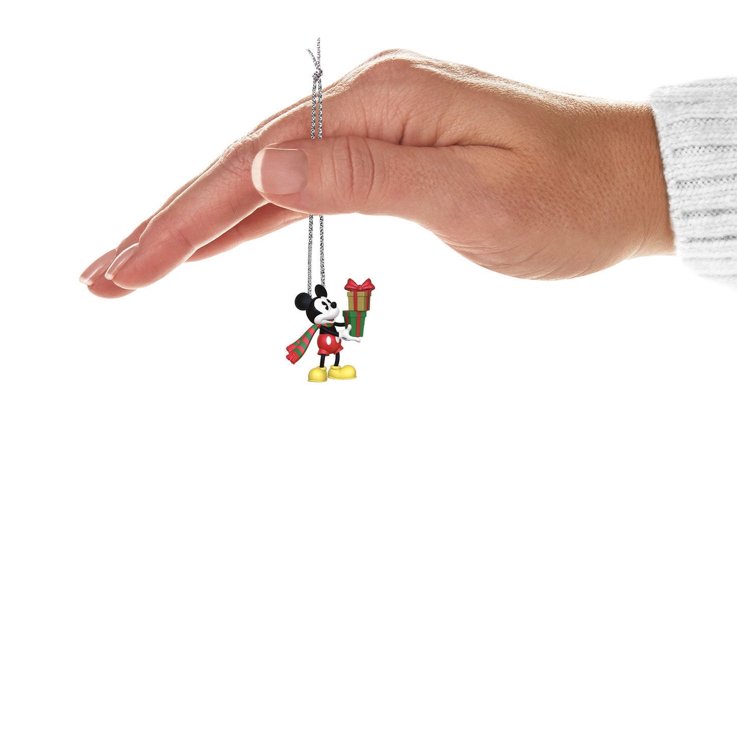 Disney Mickey Mouse, Mickey's Special Delivery (Miniature) — Hallmark Keepsake Christmas Ornament held by hand, showcasing festive details.