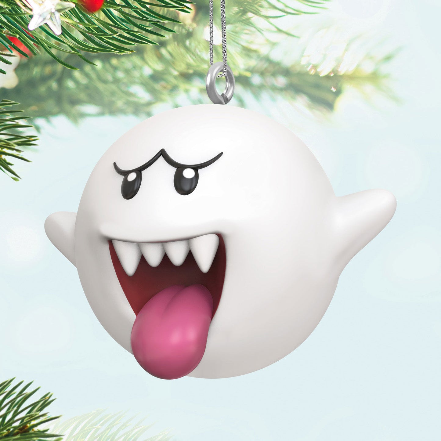 Nintendo Super Mario™ Boo (Miniature) — Hallmark Keepsake Christmas Ornament. Round white ghost with pink tongue, hanging from Christmas tree.