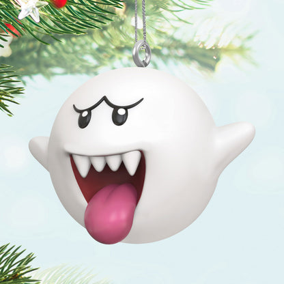 Nintendo Super Mario™ Boo (Miniature) — Hallmark Keepsake Christmas Ornament. Round white ghost with pink tongue, hanging from Christmas tree.