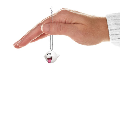 Nintendo Super Mario™ Boo (Miniature) — Hallmark Keepsake Christmas Ornament, displayed in a hand, with vibrant pink tongue detail.