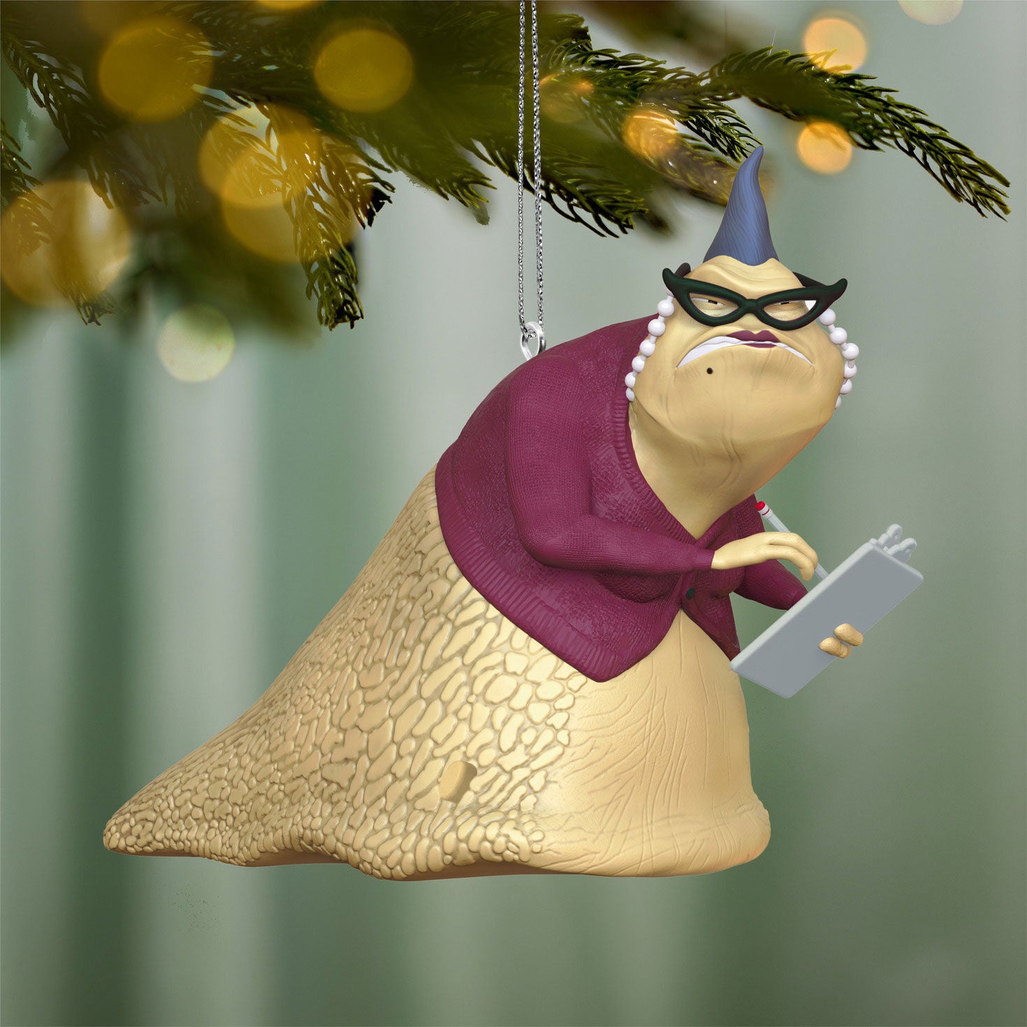 Disney/Pixar Monsters, Inc. Roz With Sound — 2026 Hallmark Keepsake Christmas Ornament, detailed figure holding clipboard with glasses, hanging on a tree.
