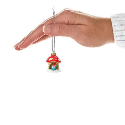 A World Within (Miniature) — Hallmark Keepsake Christmas Ornament, plastic design, featuring a gnome in a mushroom hut, held in a hand.