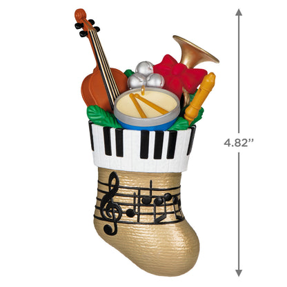 Stocking Stuffers — Hallmark Keepsake Christmas Ornament, musical themed with festive gold stocking and instrument details, close-up view.