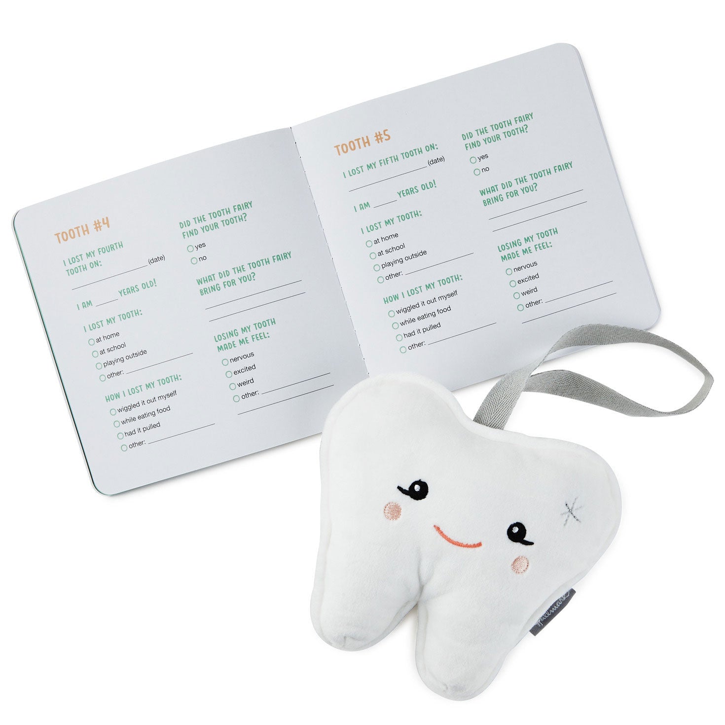 My lost tooth door hanger with pocket and booklet, plush tooth design, angled view with memory booklet open.