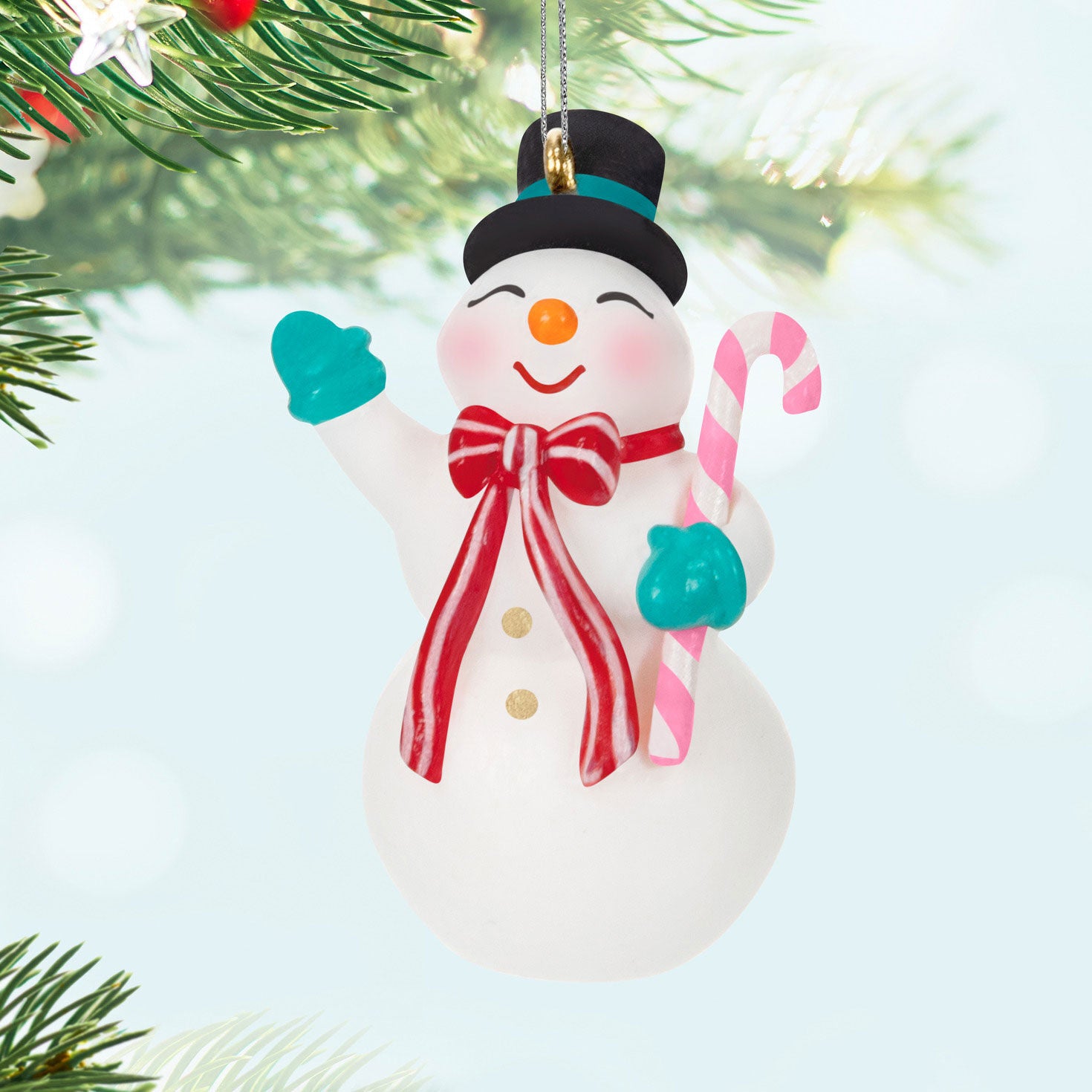 Nostalgic Snowman (Miniature) — Hallmark Keepsake Christmas Ornament with rosy cheeks, candy cane, and festive attire.