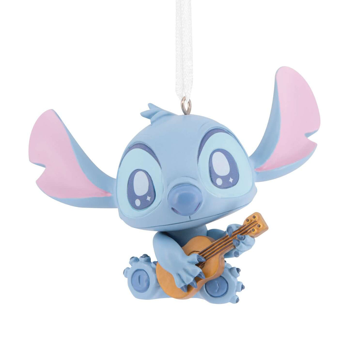 Disney Stitch with guitar - Hallmark Christmas ornament featuring a cute blue alien character playing a small acoustic guitar hanging from a ribbon.