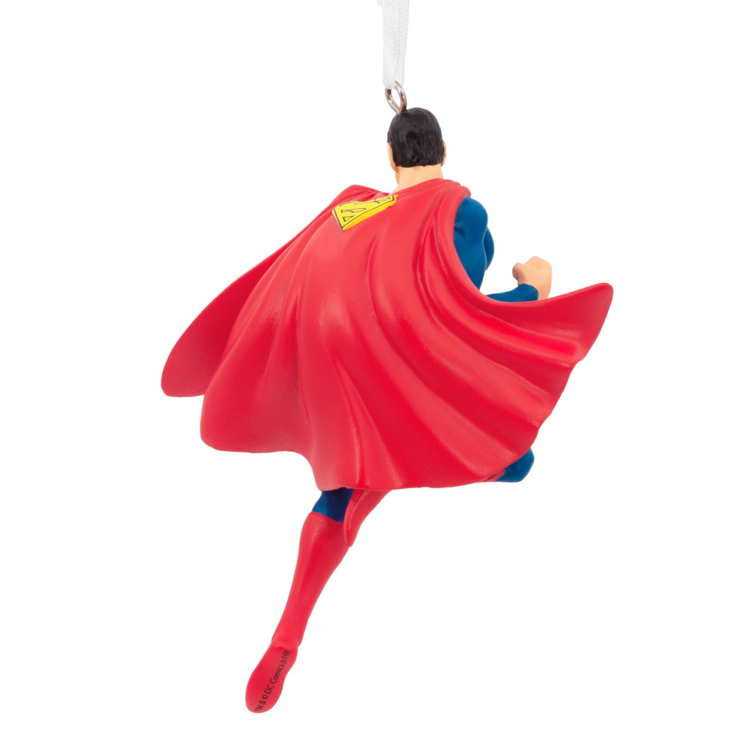 Resin Figural Superman ornament in vibrant red cape, angled rear view showcasing detail in motion.