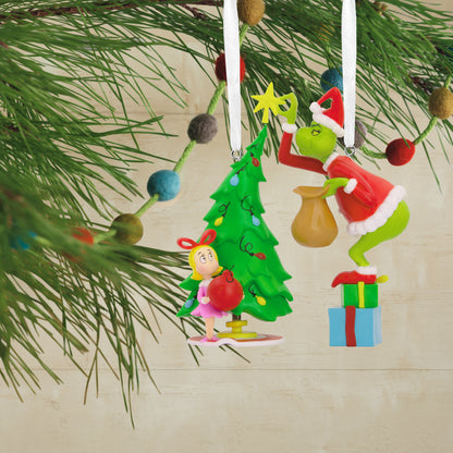 Hallmark Christmas Ornaments - Dr. Seuss's How the Grinch Stole Christmas! Grinch and Cindy-Lou Who, Set of 2, hanging by satin ribbons with festive tree.