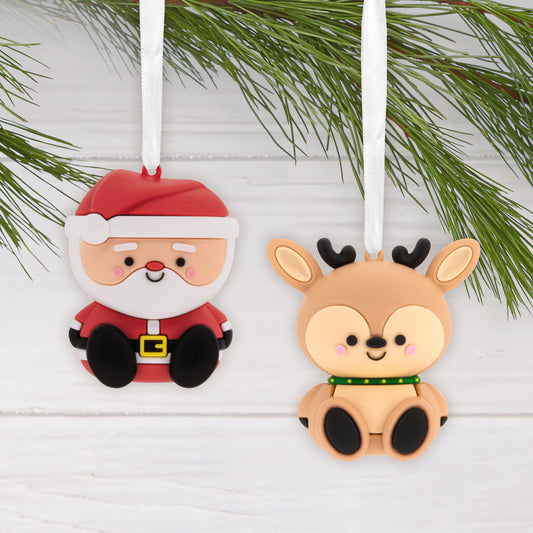 Better Together Santa and Reindeer Magnetic, Shatterproof, Set of 2 - Hallmark Christmas Ornament, close up view with hanging ribbons and festive greenery