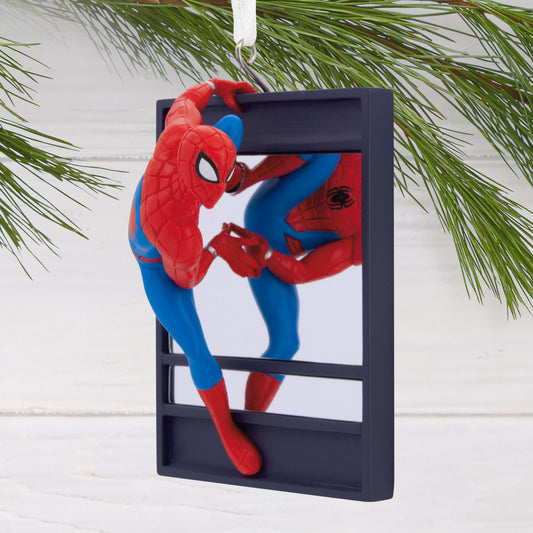 Hallmark Christmas ornament - Marvel Spider-Man on window, colourful action figure scaling a frame against a pine backdrop.