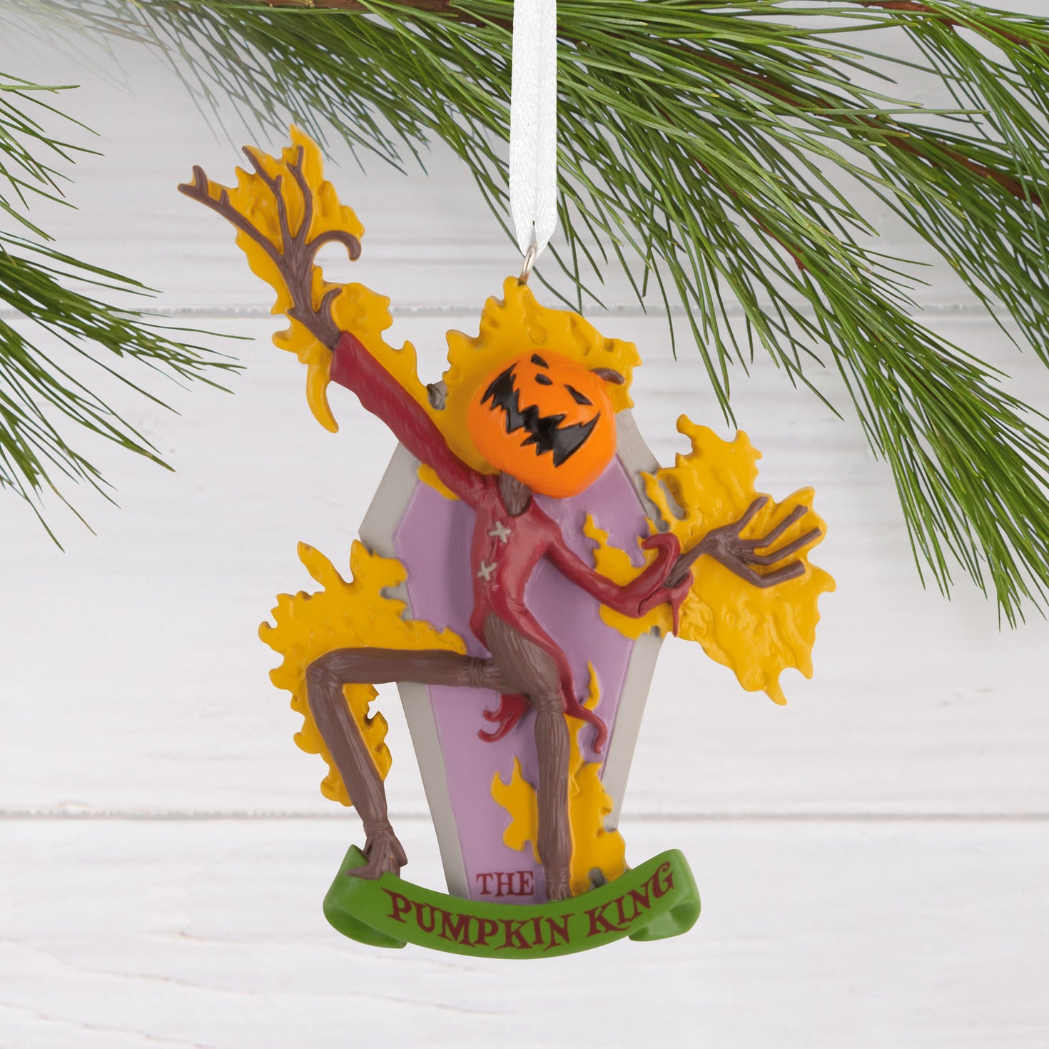 Hallmark Christmas Ornament - Disney Tim Burton's The Nightmare Before Christmas The Pumpkin King, detailed design with vibrant colours, hanging from a tree branch.