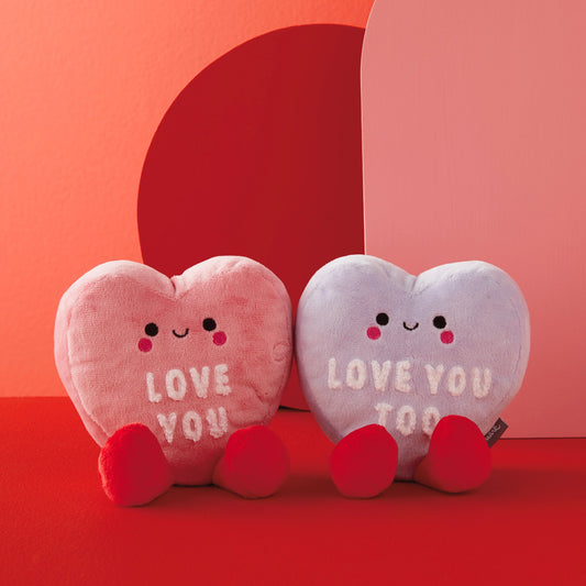 Love Hearts, Magnetic Plush - Better Together in pink and purple, featuring smiling faces and embroidered messages, angled view.