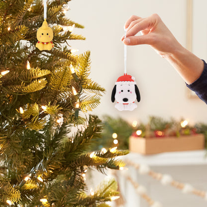 Peanuts® Better Together Holiday Snoopy and Woodstock — Hallmark Christmas Ornament hanging on an artificial Christmas tree with warm lights.