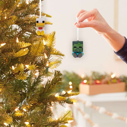 Better Together Minecraft Zombie and Chicken Jockey Magnetic, Set of 2 - Hallmark Christmas Ornament hanging on a Christmas tree with lights.