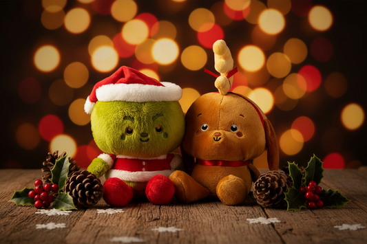 Better Together Dr. Seuss™ Grinch and Max Magnetic Plush Pair with Christmas details, featuring Grinch in a Santa hat and Max with reindeer antler, flat lay.