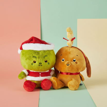 Better Together Dr. Seuss™ Grinch and Max magnetic plush pair featuring Grinch in Santa attire and Max with reindeer antler, flat lay.