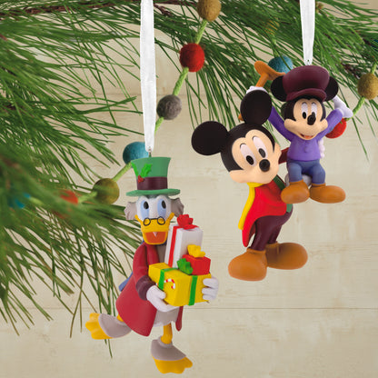 Hallmark Christmas ornaments - Disney Mickey's Christmas Carol, set of 2, featuring Mickey Mouse and Scrooge McDuck hanging from a pine branch.