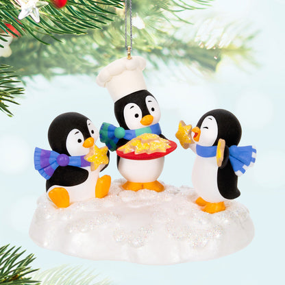 Cookie Exchange — Hallmark Keepsake Christmas Ornament featuring three playful penguins on a snowy base, artist-crafted detail.