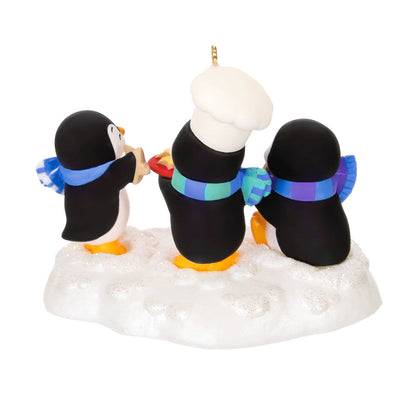 Cookie Exchange — Hallmark Keepsake Christmas Ornament features playful penguins baking on a snowy base, with vibrant scarves and chef hat.