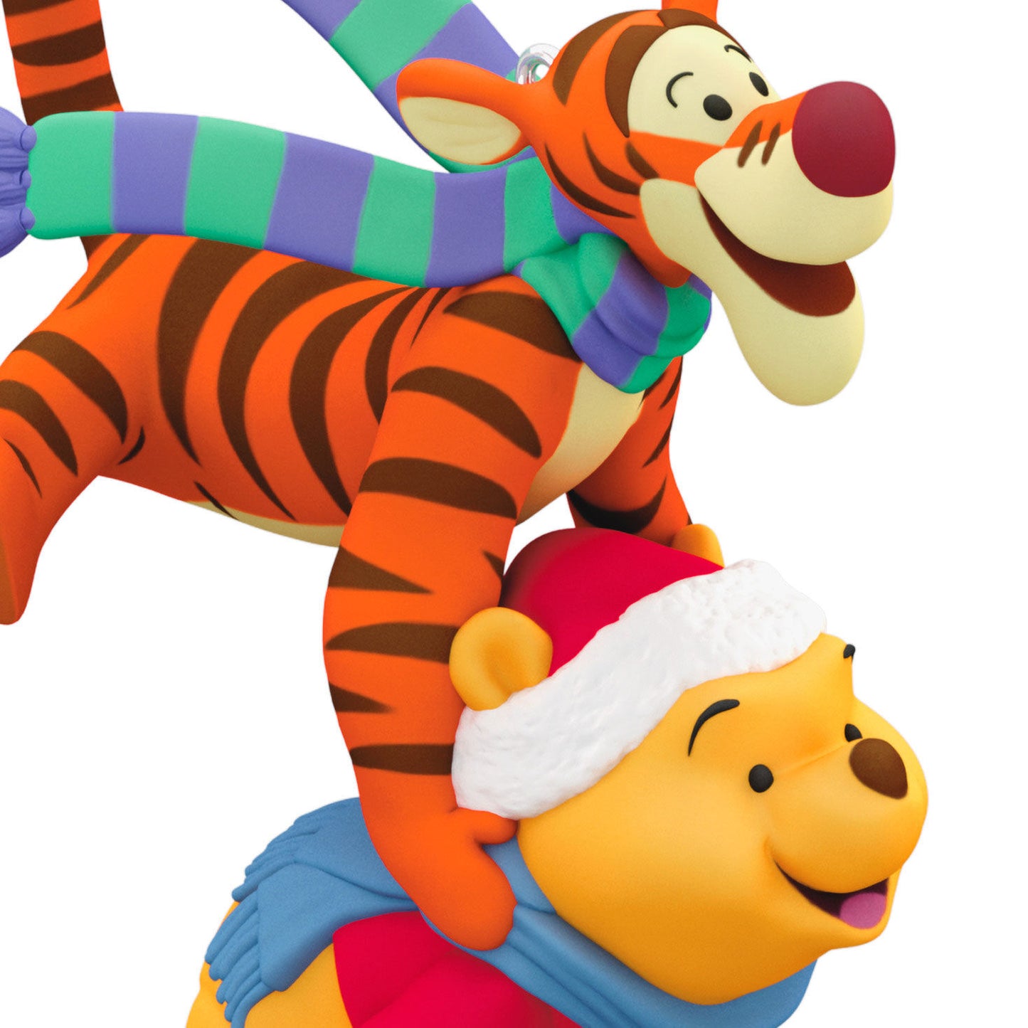 Disney Winnie the Pooh, Leapfrogging Friends — Hallmark Keepsake Christmas Ornament featuring Tigger and Pooh bundled in winter scarves with playful expressions.