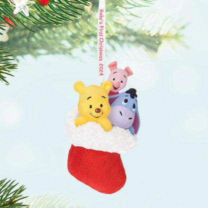 Disney Winnie the Pooh, A Snuggly First Christmas — Hallmark Keepsake Christmas Ornament featuring Pooh, Piglet and Eeyore in a red stocking, detailed view.