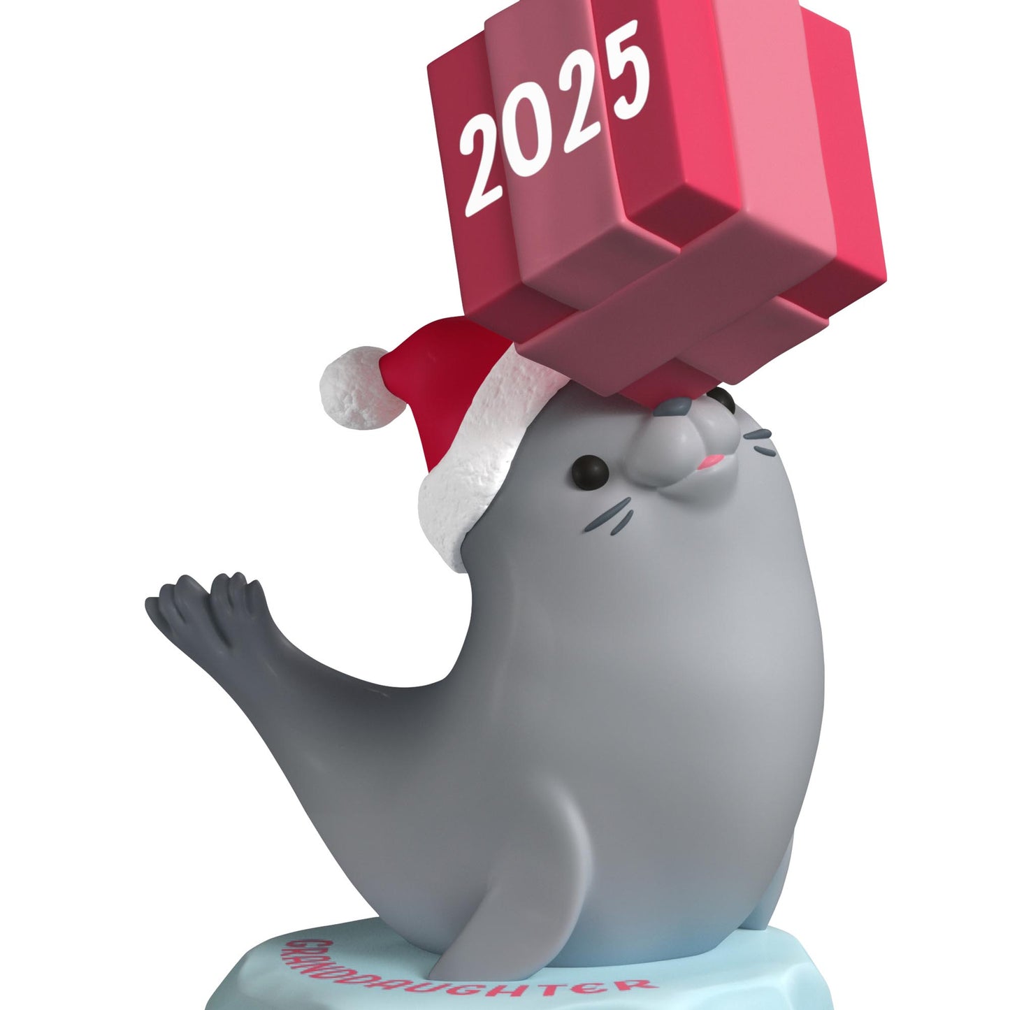 Granddaughter — 2025 Hallmark Keepsake Christmas Ornament featuring a grey seal wearing a Santa hat, balancing a pink present.
