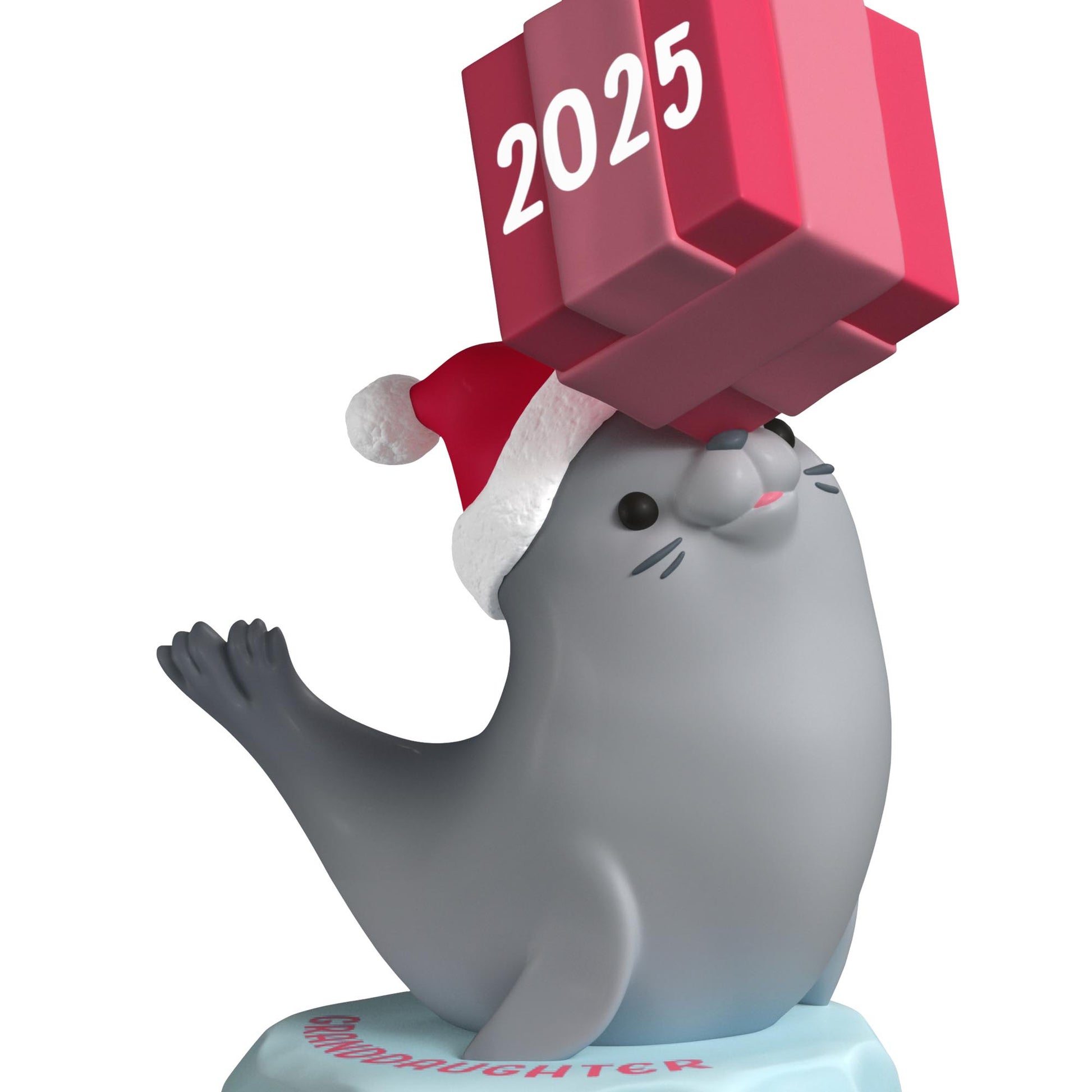Granddaughter — 2025 Hallmark Keepsake Christmas Ornament featuring a grey seal wearing a Santa hat, balancing a pink present.