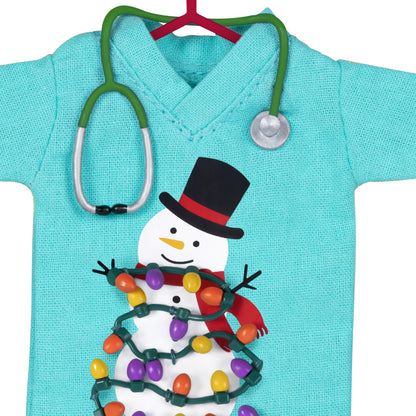 The Caring Spirit, Nurses — 2025 Hallmark Keepsake Christmas Ornament, teal scrubs shirt, holiday snowman, detailed stethoscope