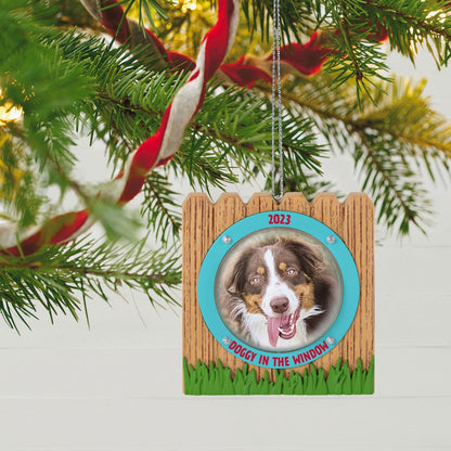 Doggy in the Window Photo Frame — Hallmark Keepsake Christmas Ornament hanging on a tree, showcasing a dog's playful photo.